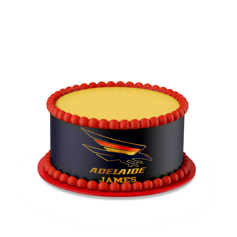 Adelaide Crows edible cake strips with red and navy graphics wrapped around rectangular cake
