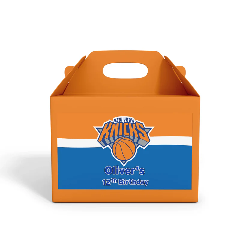 New York Knicks treat box label with bold blue and orange Knicks theme flat lay on party table