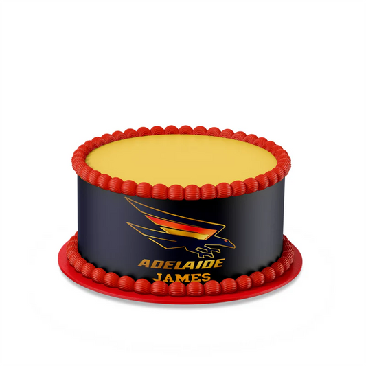 Adelaide Crows edible cake strips with red and navy graphics wrapped around rectangular cake