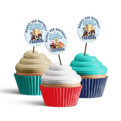 All Star Sports personalized cupcakes toppers featuring small round multi-sport graphics attached to wooden cocktail picks.