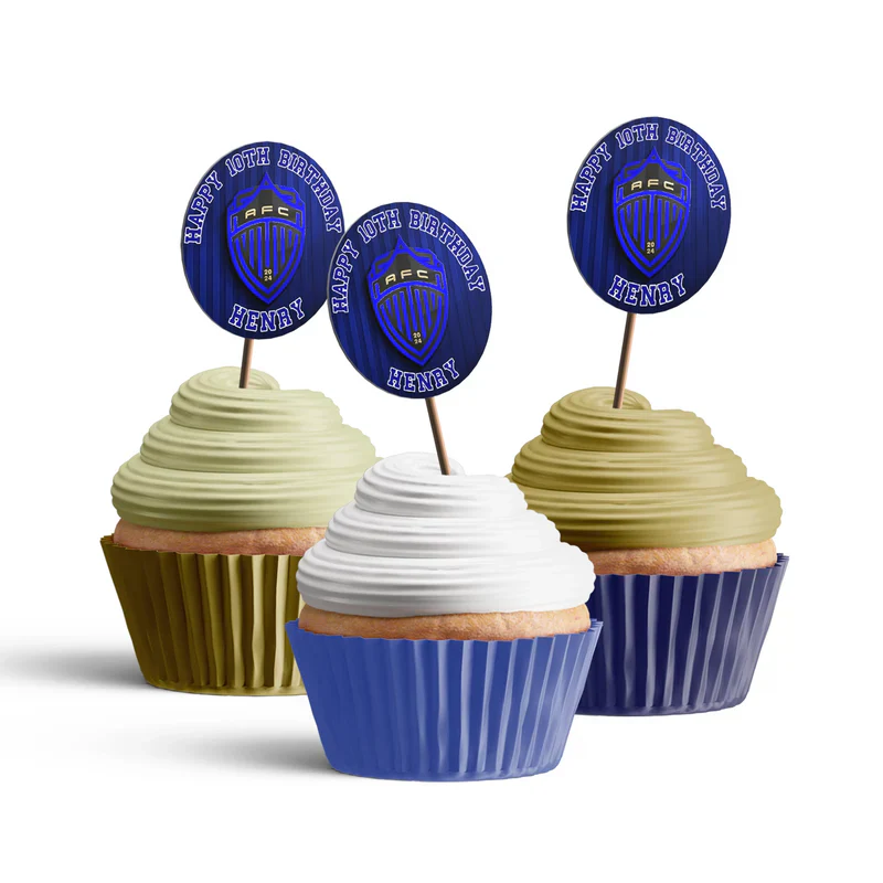 Auckland FC cupcake toppers with green and blue soccer theme placed on frosted cupcakes