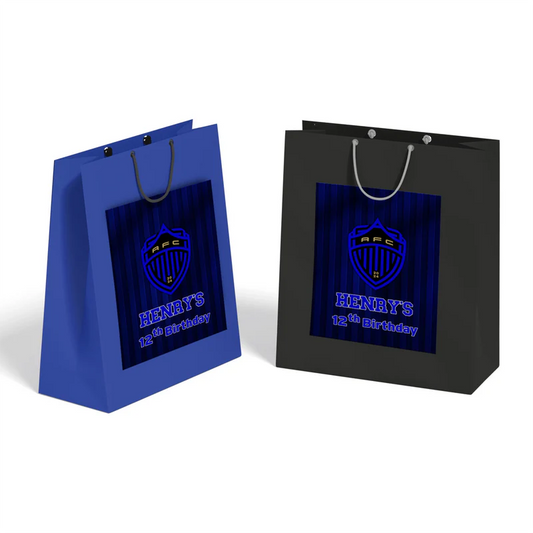 Auckland FC goodie bag label with bold green blue football design on white paper bag