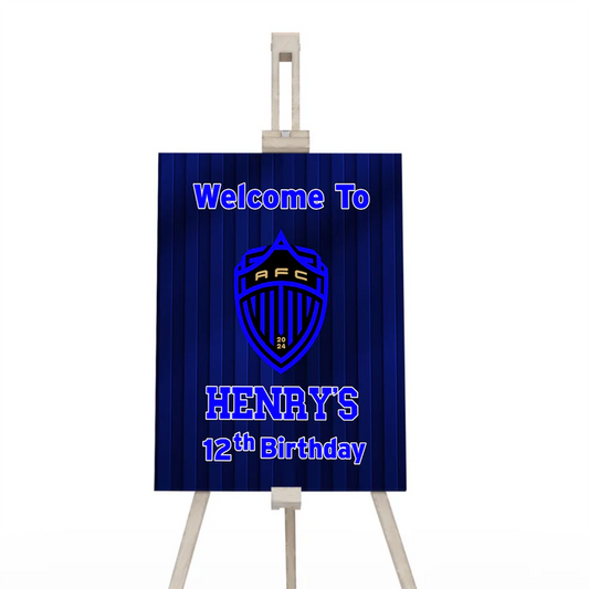 Auckland FC welcome sign with soccer field design and personalized greeting on easel