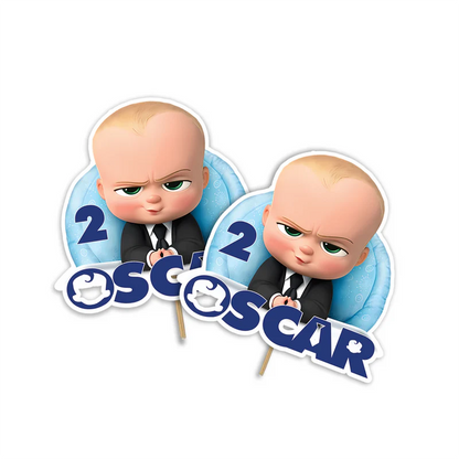 The Boss Baby cake toppers featuring cut-out characters and custom name in cardstock flat lay on white background