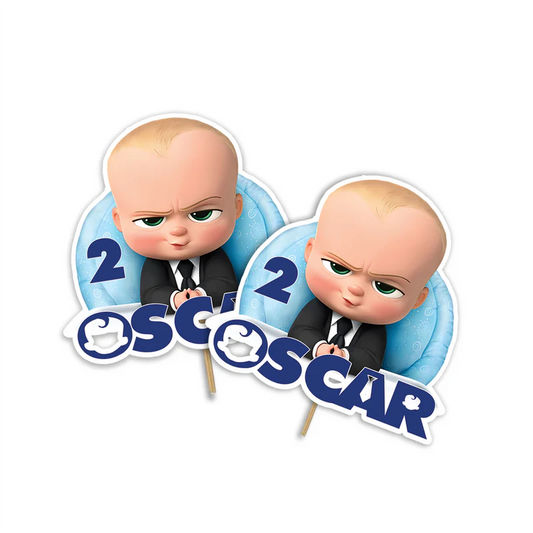 The Boss Baby cake toppers featuring cut-out characters and custom name in cardstock flat lay on white background