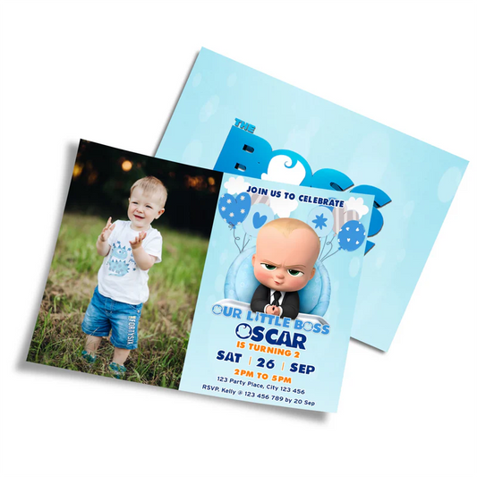 The Boss Baby photo card invitations featuring child photo and theme graphics laid flat with envelopes