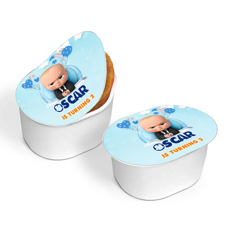 The Boss Baby mini Pringles label with blue border and text applied to small snack-size can on flat surface