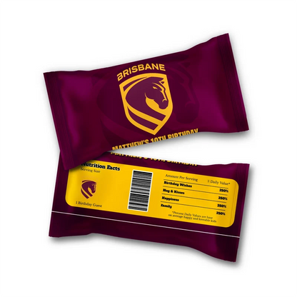 Brisbane Broncos Skittles label wrap showing a team candy packaging layout displayed on a neat tabletop