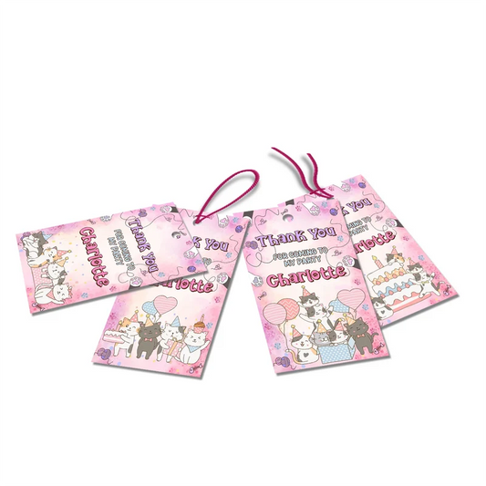 Cats & Kittens thank you tags with colorful text accents displayed on a neatly wrapped party favor box