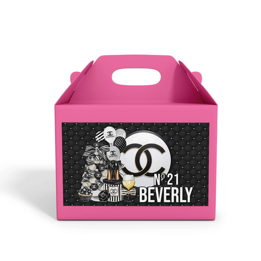 Chanel inspired treat box label with elegant black, white, and gold accents on white background