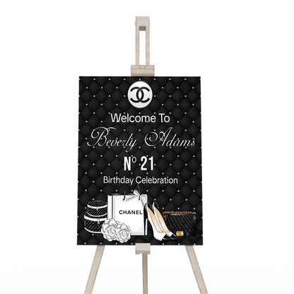 Chanel inspired welcome sign with elegant black and white luxury design on white background