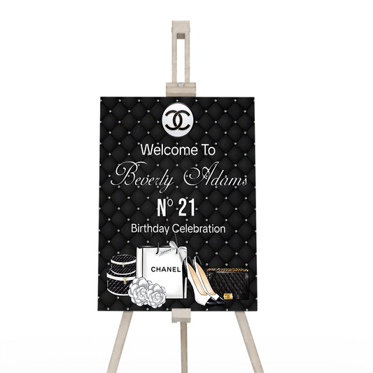 Chanel inspired welcome sign with elegant black and white luxury design on white background