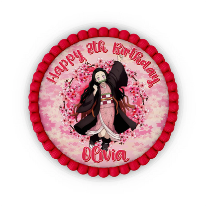 Demon Slayer Nezuko edible icing cake image with a pink background displayed on a round frosted cake