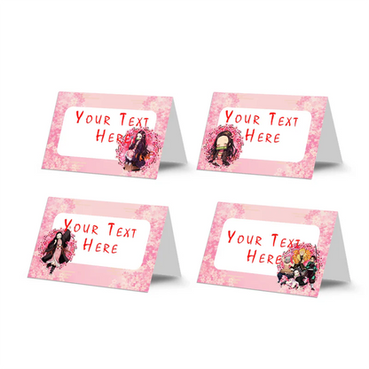 Demon Slayer Nezuko food cards showing tented buffet labels with pink anime graphics on a wooden surface