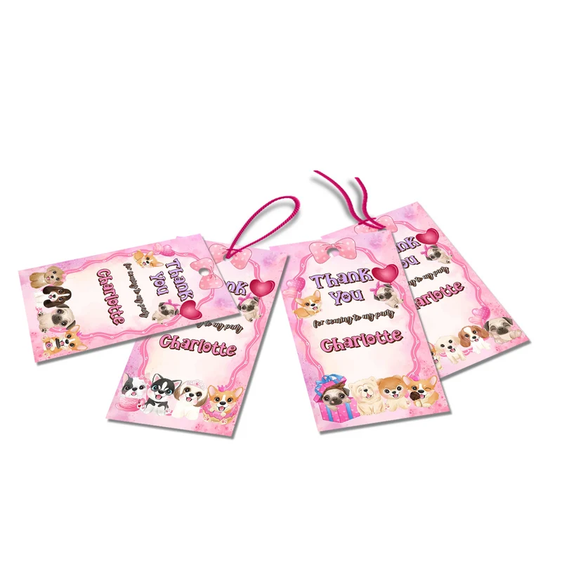 Puppy & Dog thank you tags with colorful text accents displayed on a neatly wrapped party favor box