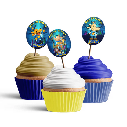 Dog Man personalized cupcake toppers arranged neatly on frosted treats against a neutral backdrop