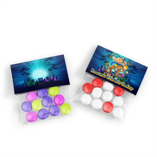 Dog Man treat bag topper label showing a colorful folded paper design sealing a clear candy pouch