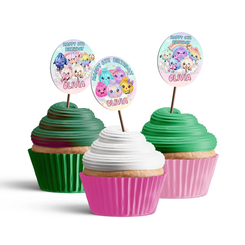 Glitter Dumpling personalized cupcake toppers arranged neatly on frosted treats against a neutral backdrop