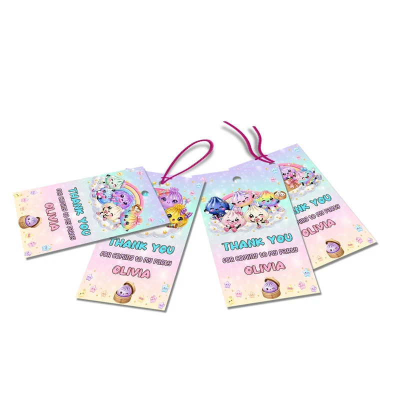 Glitter Dumpling thank you tags with colorful text accents displayed on a neatly wrapped party favor box
