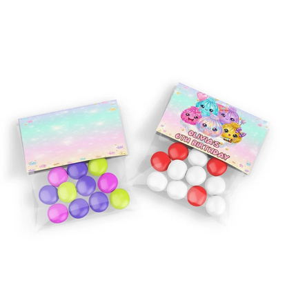 Glitter Dumpling treat bag topper label showing a colorful folded paper design sealing a clear candy pouch