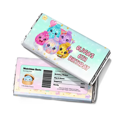 Glitter Dumpling chocolate label wrap featuring a colorful candy bar packaging layout against a white surface