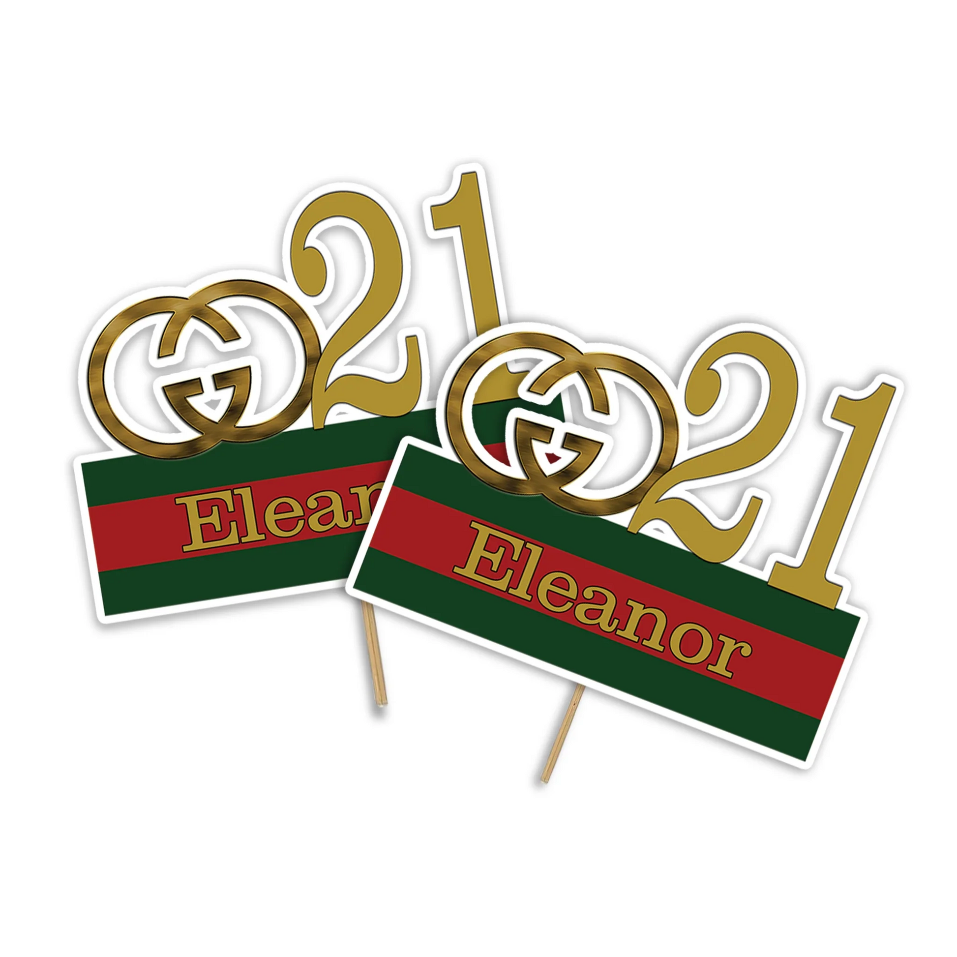 Gucci inspired personalized cake toppers in gold and green red stripe design flat lay on table