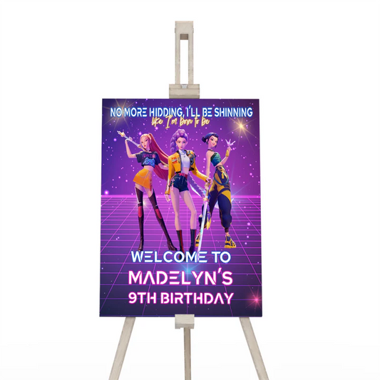 Huntrix Kpop Demon Hunters welcome sign with large colorful graphics on vertical display poster
