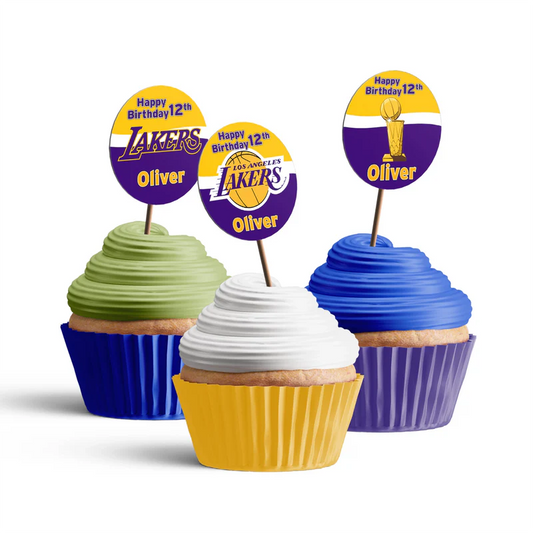 LA Lakers cupcake toppers with round team designs on purple frosted cupcakes arranged in rows