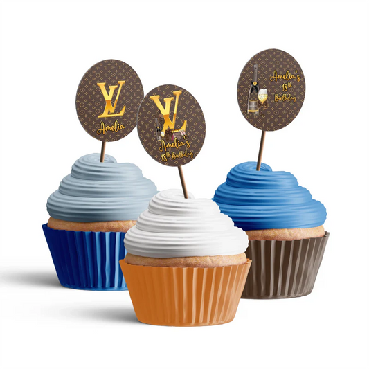 Louis Vuitton inspired cupcake toppers with brown gold monogram design arranged on frosted cupcakes