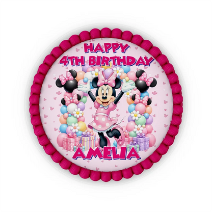 Minnie Mouse edible icing cake images with colorful character illustrations placed on a frosted round cake