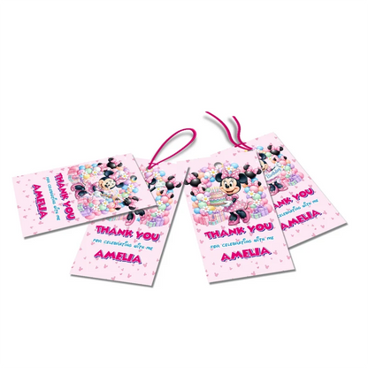 Minnie Mouse thank you tags with colorful text accents displayed on a neatly wrapped party favor box