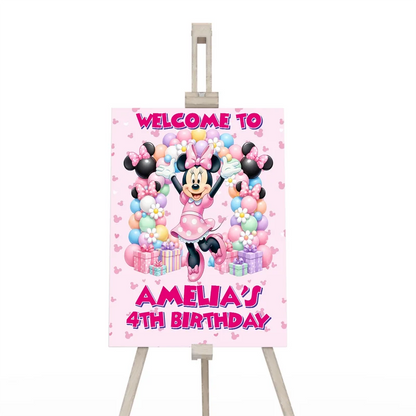 Minnie Mouse welcome sign displaying a vibrant party theme greeting layout on a wooden display easel