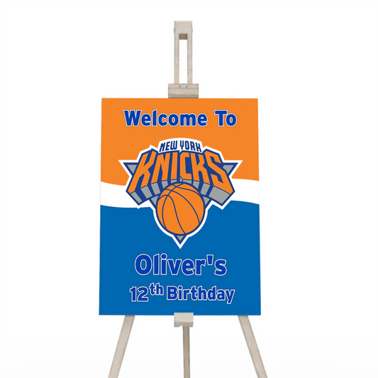 New York Knicks welcome sign with blue orange graphics and custom greeting on foam board