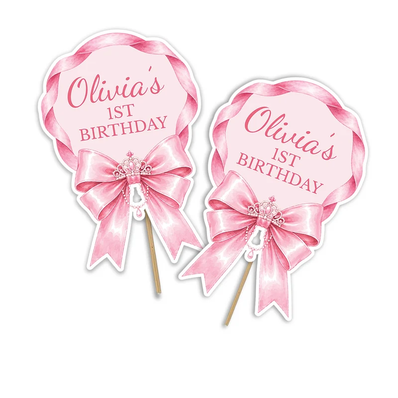 Pink Bow personalized cake toppers featuring delicate ribbon bow graphics on a modern dessert table display