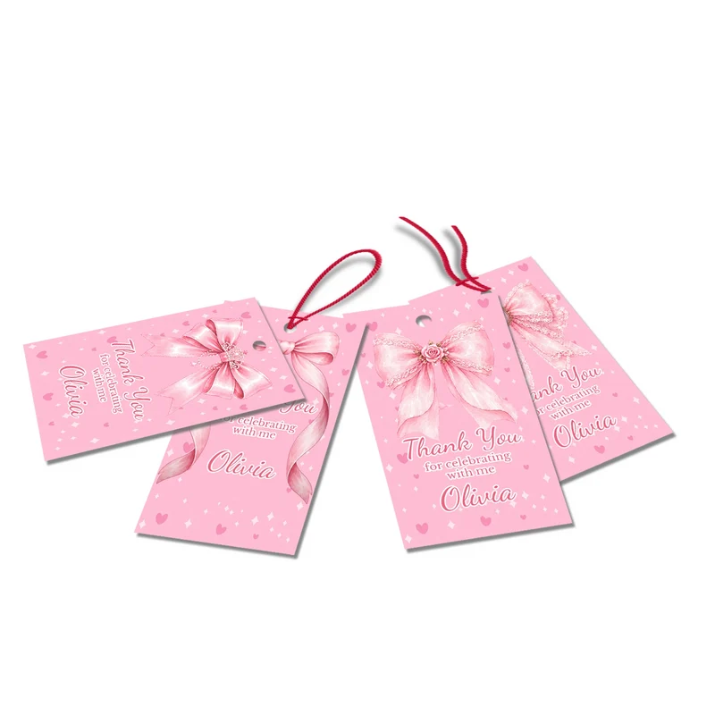 Pink Bow thank you tags with elegant script text accents displayed on a neatly wrapped party favor box