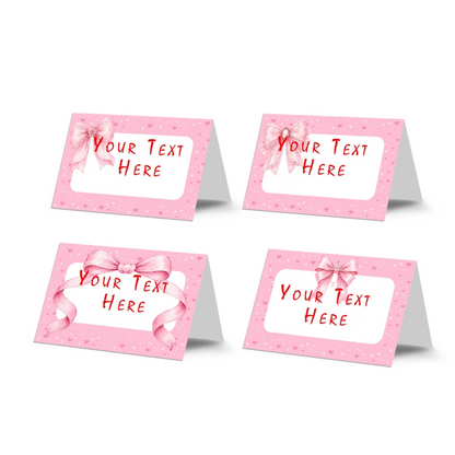 Pink Bow food cards showing a collection of charming buffet labels arranged on a decorated treat table