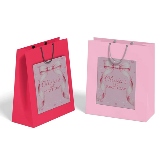Pink Bow goodie bag label featuring a charming party theme design applied to a classic paper gift bag