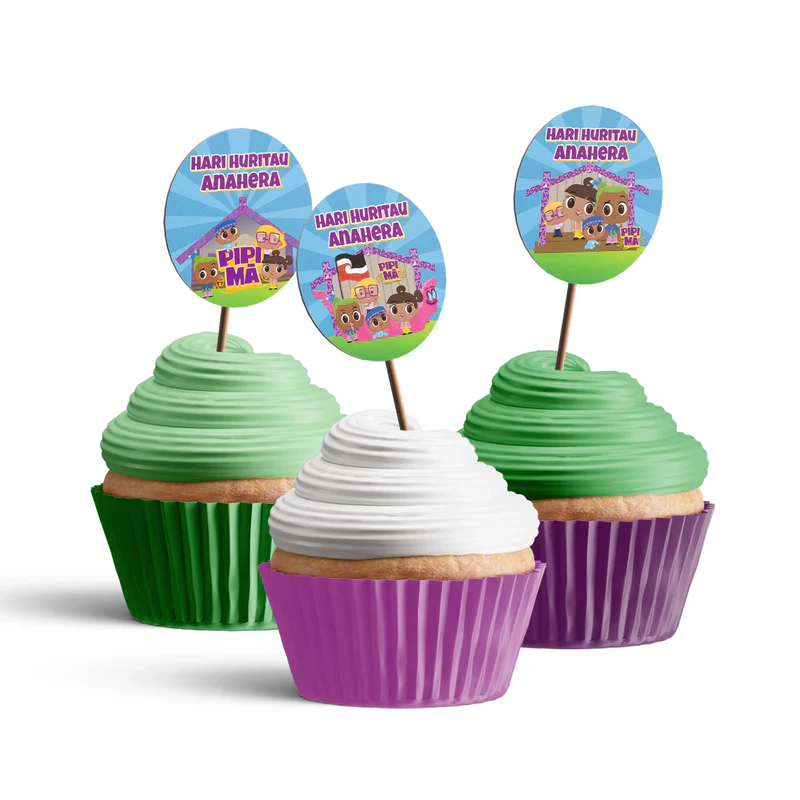 Pipi Ma personalized cupcake toppers arranged neatly on frosted cupcakes against a neutral backdrop