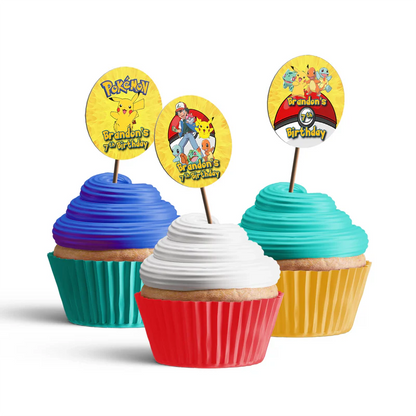 Pokemon cupcakes toppers with small circular character portraits and custom name initials on flat lay.