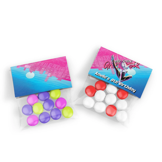 Spider-Woman treat bag topper label with web design in red, blue, and black on white background