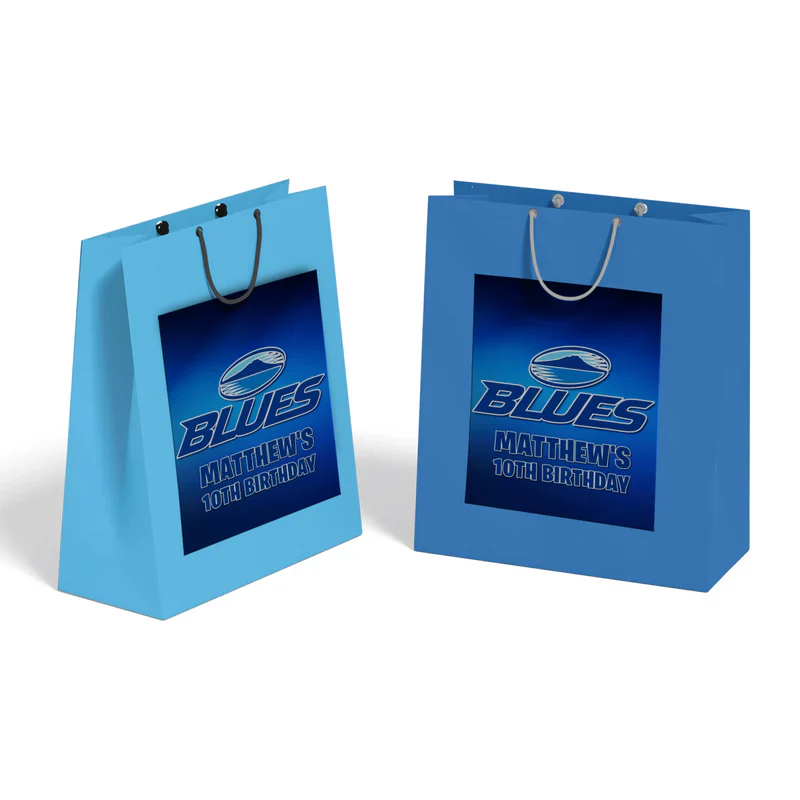 The Blues Rugby goodie bag label displayed as a paper fold-over header card attached to a clear plastic treat pouch.
