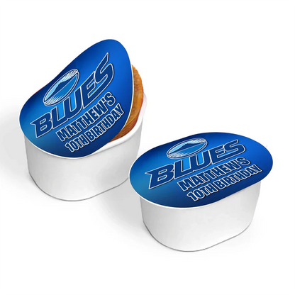 The Blues Rugby mini Pringles label sticker showing custom birthday text and blue rugby balls on a small snack canister.