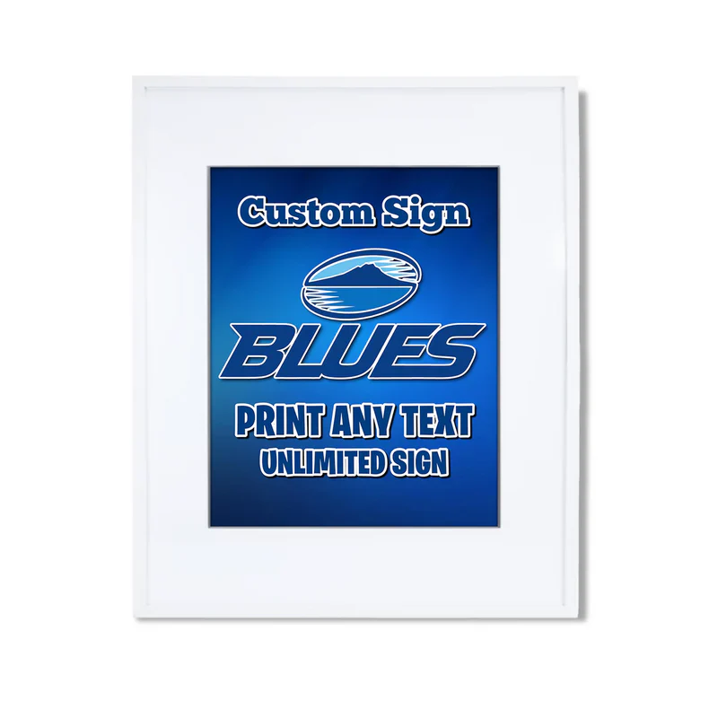 The Blues Rugby custom sign displaying a rectangular board with bold team typography on a dark wood table easel mockup.
