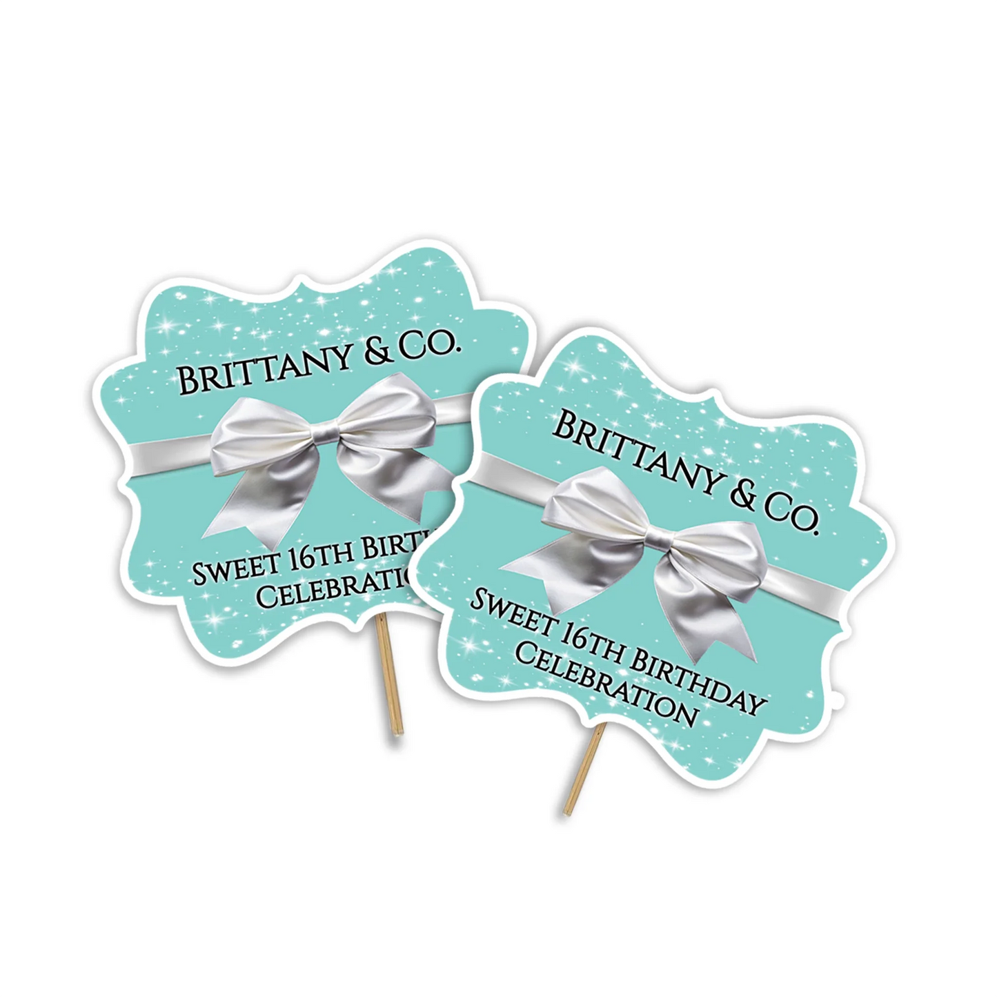 Tiffany & CO cake toppers featuring a classic blue bow and custom birthday age on a clean white background