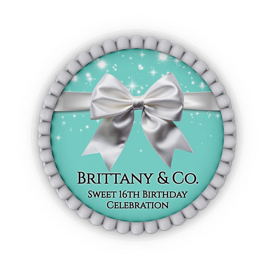 Tiffany & CO edible icing cake images with personalized name and elegant white typography on a teal blue circle