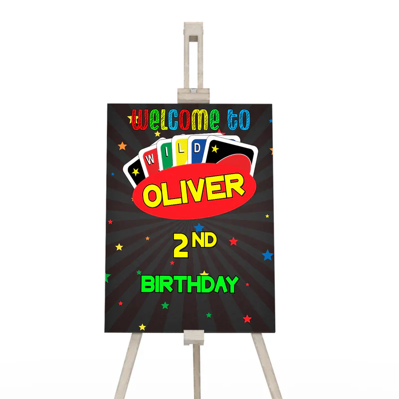 Uno welcome sign featuring bright personalized greeting in red, yellow, and blue, set on easel or wall