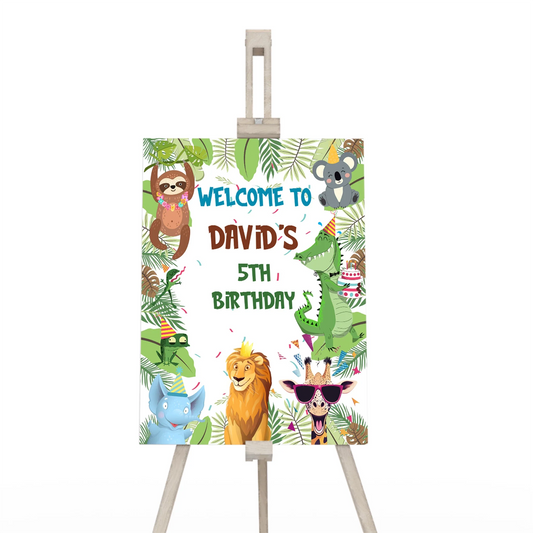 Zoo party welcome sign featuring a large giraffe and tropical leaves with custom name on white background